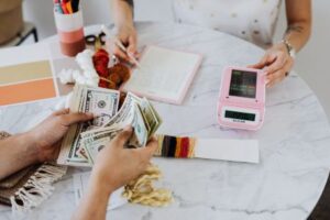 hand holding dollar bills